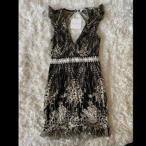Black sequin/glitter mini dress